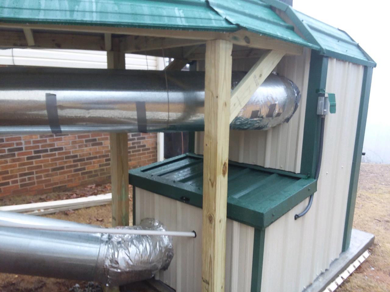 12" insulated ductwork connected to hot air wood furnace